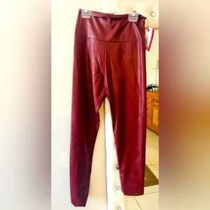 leatherette wine leggings . New with Tags .